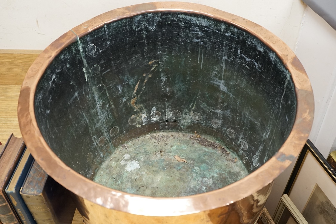 A large riveted copper vat, 34cm high x 51cm diameter.